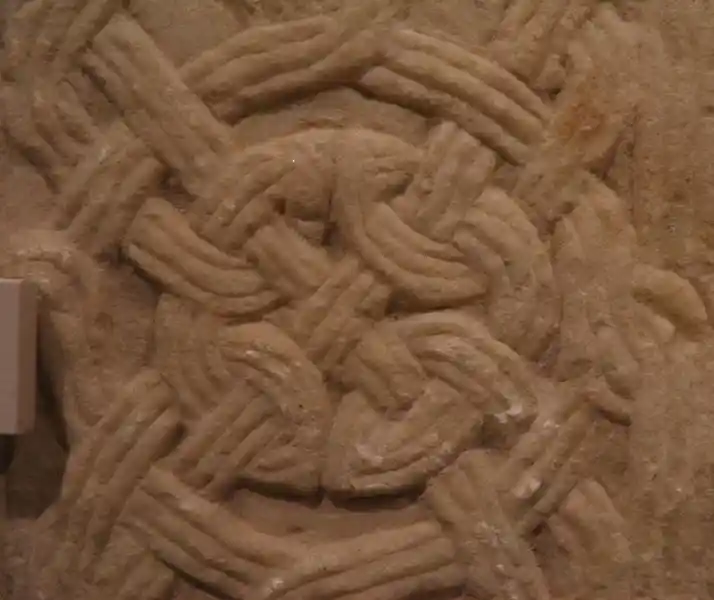 Cross in the center of a brick